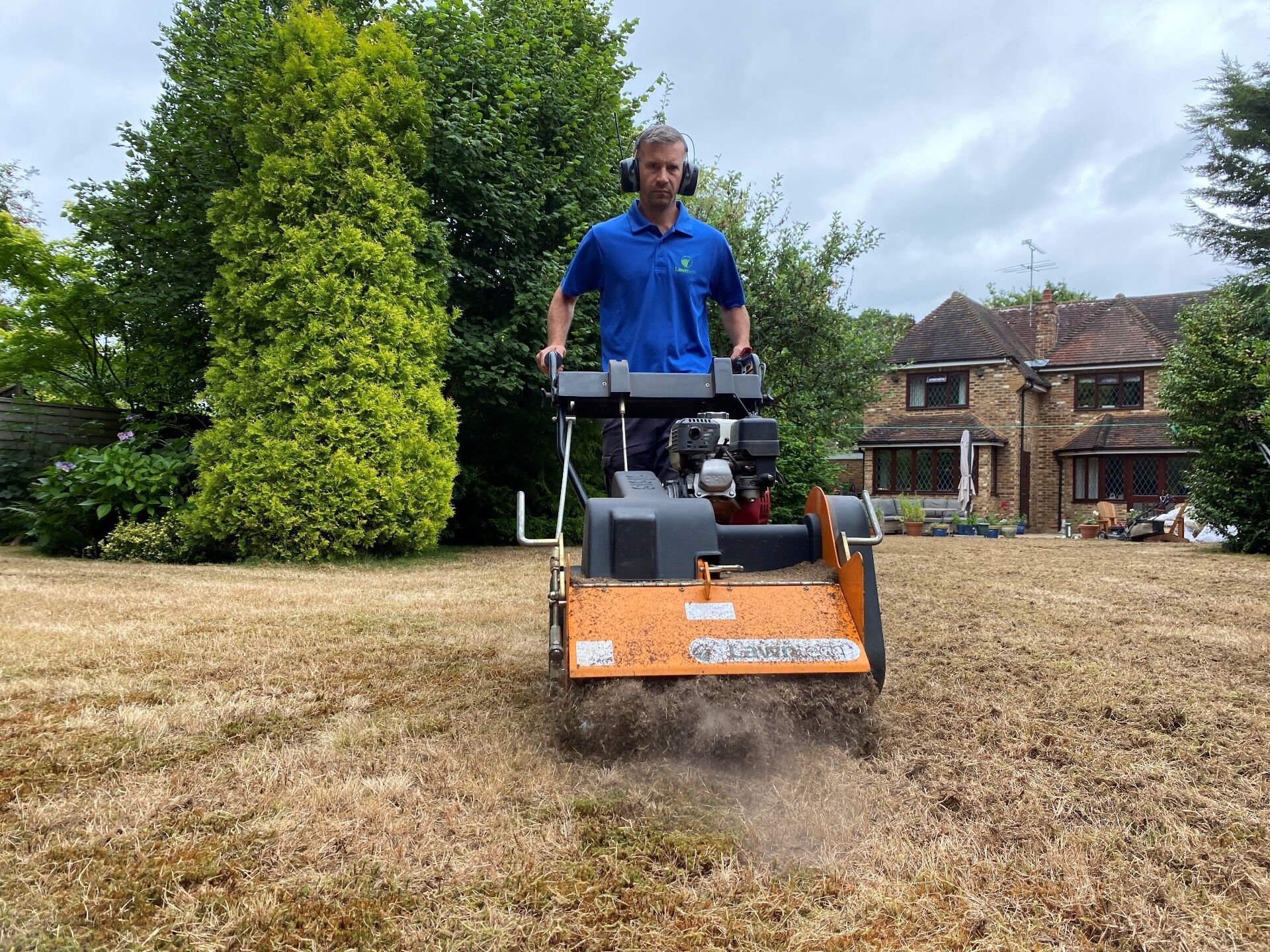 Lawn Scarification with a Push Mower